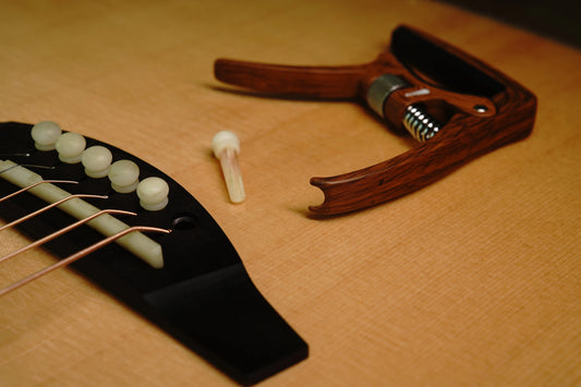 How-an-Adjustable-Trigger-Capo-Can-Improve-Your-Guitar-Tone Sondery Music